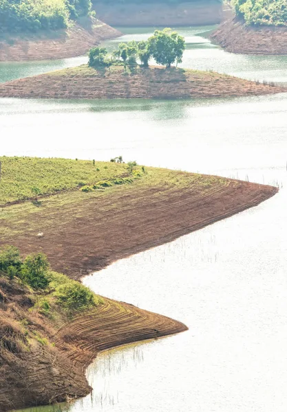 Sunny afternoon on the hillside hydrogen lake Ta Dung. There are large reservoirs providing water for large areas in the highlands of Vietnam