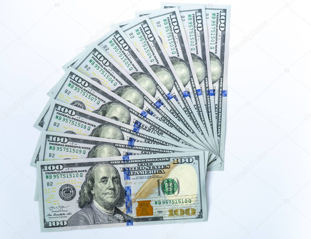 USD 100 dollars banknotes on a group of money isolated on white background. Business and finance concept.