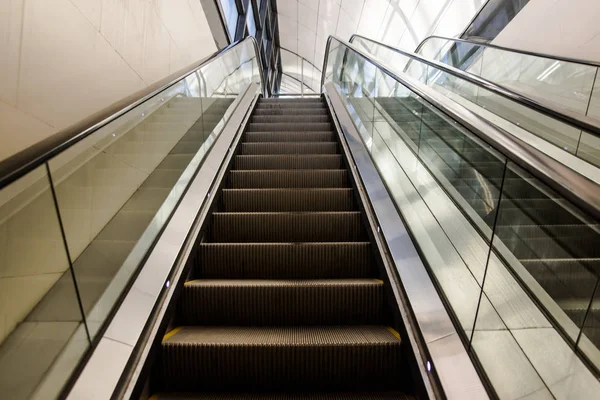 Escalator in modern building or business center of a city