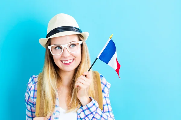 Woman holding French flag — Stock Photo, Image