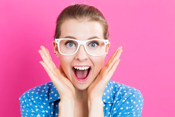 Überraschte junge Frau — Stockfoto