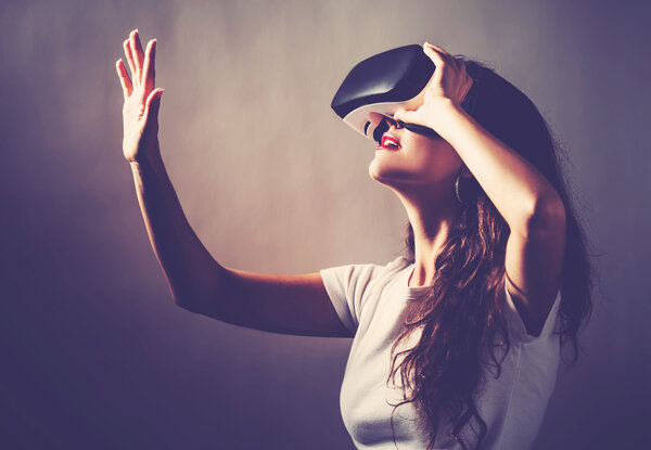 Woman using virtual reality headset