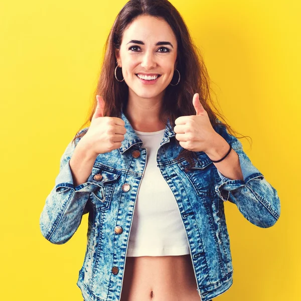 Woman giving thumbs up — Stock Photo, Image