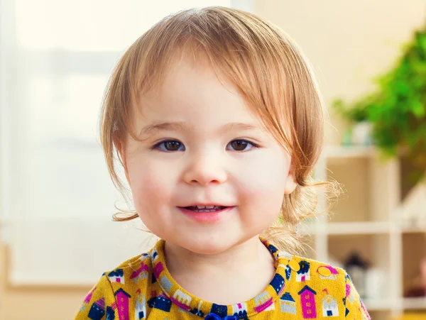 Happy toddler girl in house — Stock Photo, Image