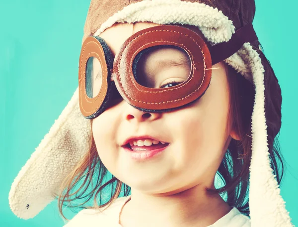 Happy toddler girl in pilot glasses Royalty Free Stock Images