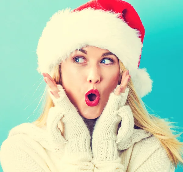 Mujer en santa hat posando — Foto de Stock