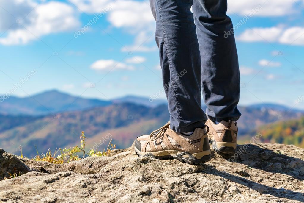 Male feet on edge of cliff ⬇ Stock Photo, Image by © Melpomene 128593426