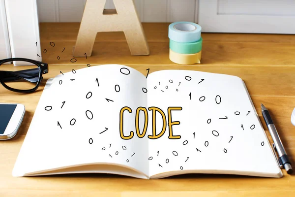 Koden koncept med notebook — Stockfoto