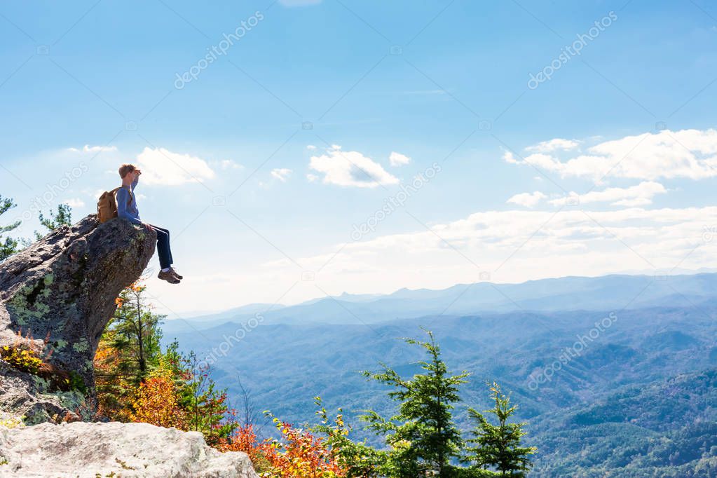 Man at the edge of a cliff