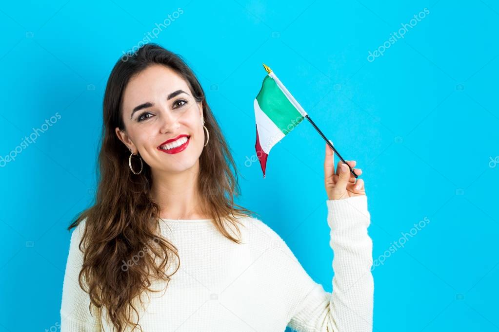 Young woman holding Italian flag
