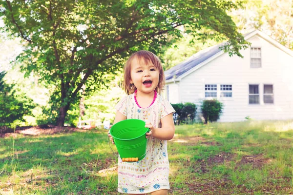 Happy toddler girl playing outside — Stock Photo, Image