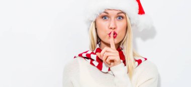 Young woman with Santa hat clipart