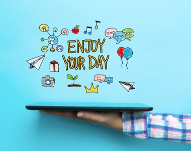 Your gün kavramı bir tablet ile keyfini çıkarın 