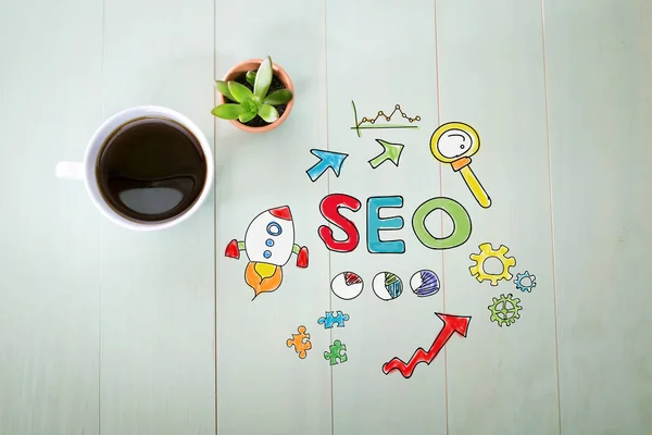 SEO concept con una tazza di caffè — Foto Stock