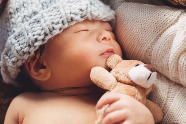 Newborn baby boy in a basket — Stock Photo, Image