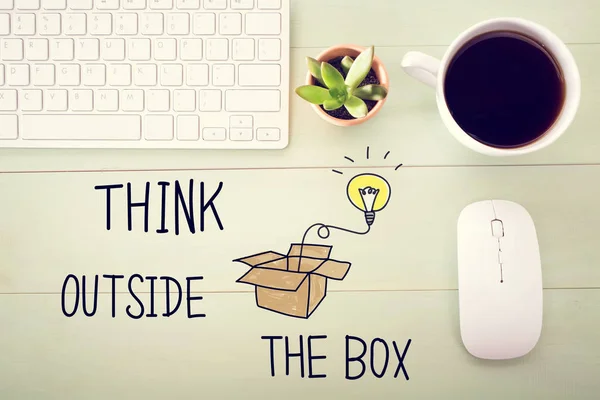 Think Outside The Box koncepció a munkaállomás — Stock Fotó