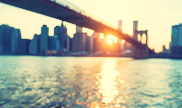 Defocused view of the New York skyline from Brooklyn Bridge Park