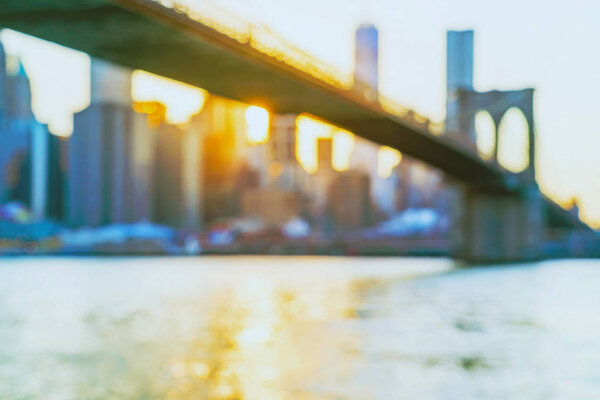 Defocused view of the New York skyline from Brooklyn Bridge Park