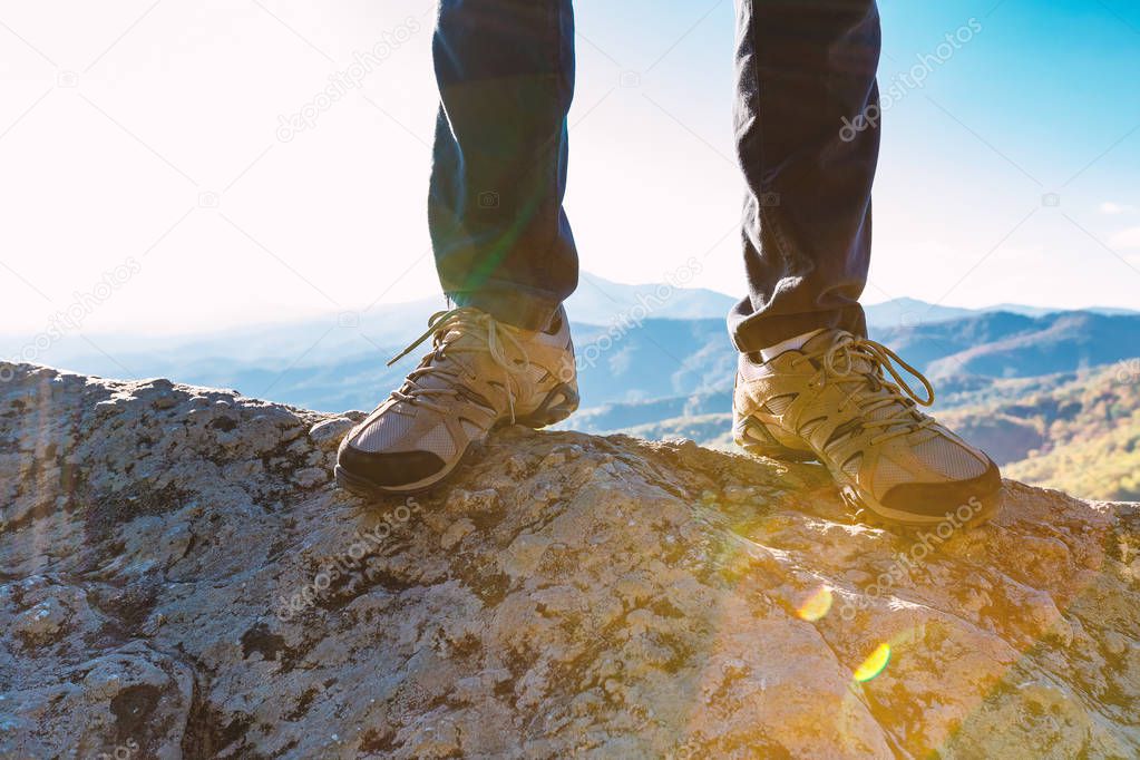 Man at the edge of a cliff