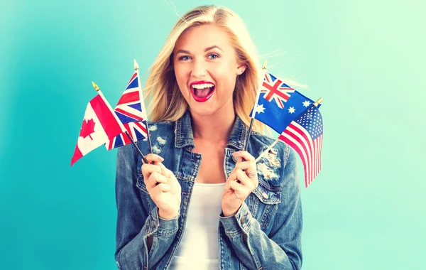 Woman with flags of English speaking countries