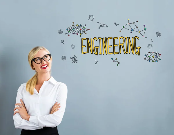 Engineering tekst met zakenvrouw — Stockfoto