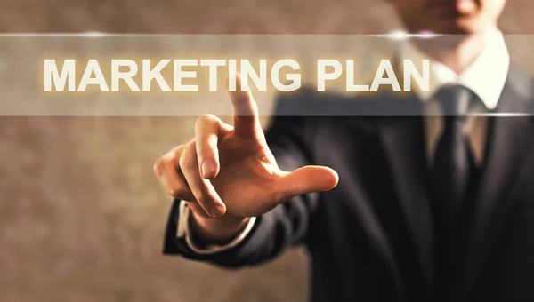 Marketing Plan tekst met zakenman — Stockfoto