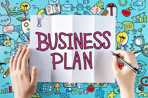 Business Plan tekst met handen — Stockfoto