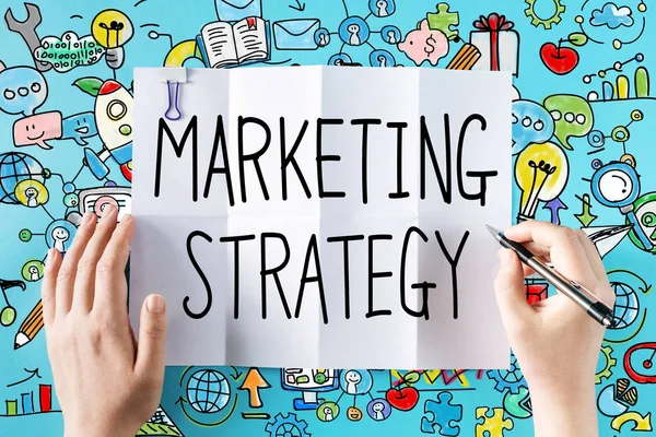 Texto de estrategia de marketing con manos —  Fotos de Stock