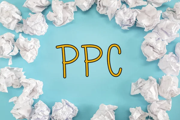 PPC tekst met papier ballen — Stockfoto