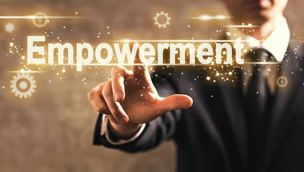 Empowerment tekst met zakenman — Stockfoto