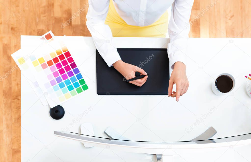 Graphic designer using graphic tablet