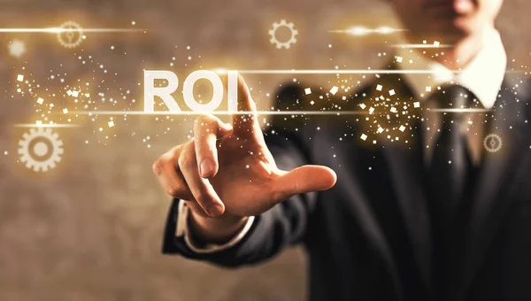 ROI text with businessman — Stock Photo, Image