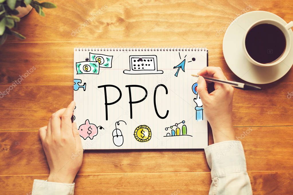 PPC text with a person holding a pen 