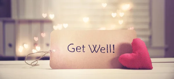 Get Well message with a red heart — Stock Photo, Image