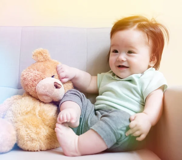 Baby boy with teddy bear — Stock Photo, Image