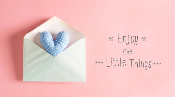 Message with a blue heart cushion — Stock Photo, Image