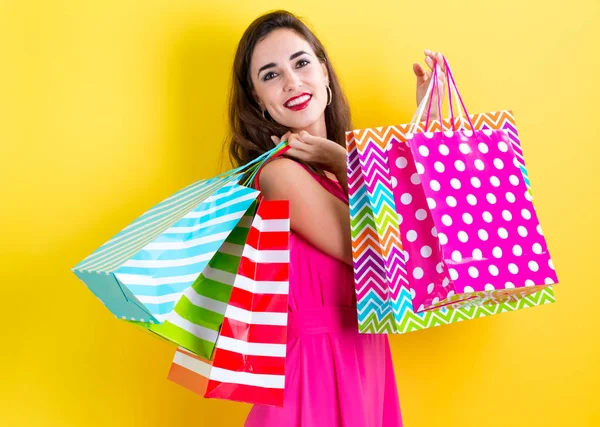 Mujer sosteniendo bolsas de compras — Foto de Stock