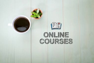 Online Courses concept with a cup of coffee  clipart