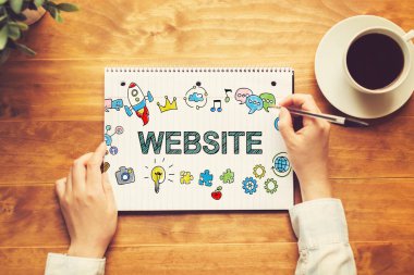 Bir kalem tutan bir kişi ile Web sitesi metin