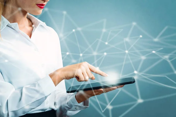 Business woman using a tablet — Stock Photo, Image