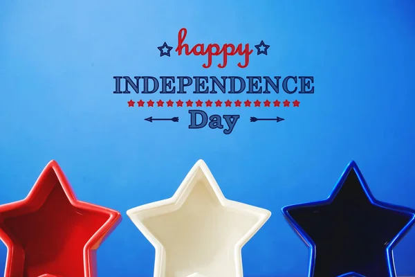 4th of July decorations on blue background — Stock Photo, Image