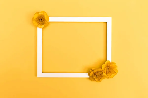 Picture frame with flowers on yellow