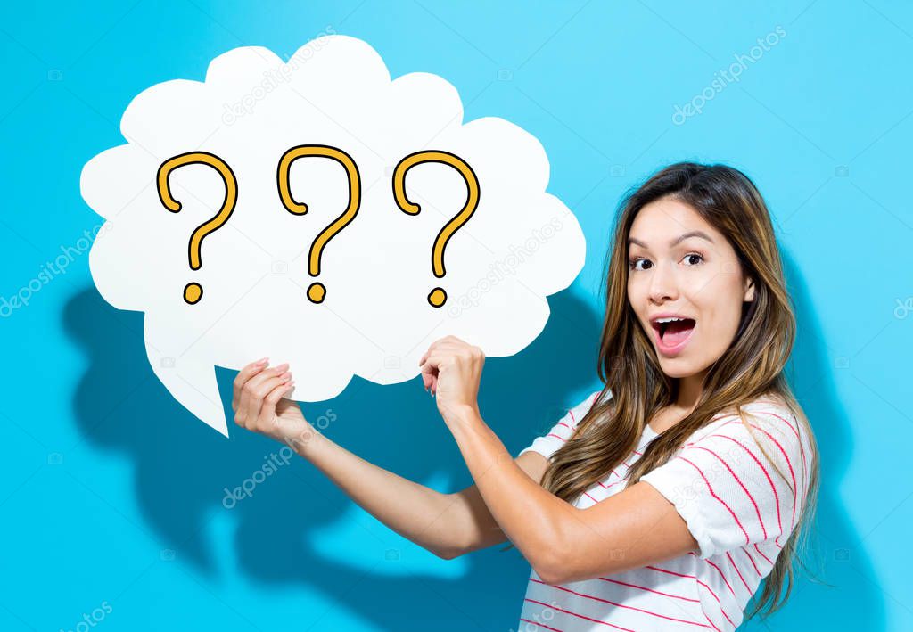 Question Mark text with young woman holding a speech bubble
