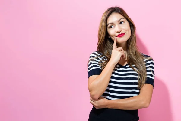 Mujer en una pose reflexiva — Foto de Stock