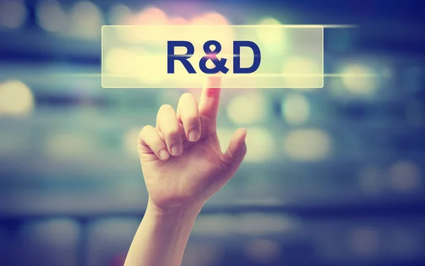 R och D koncept med hand — Stockfoto