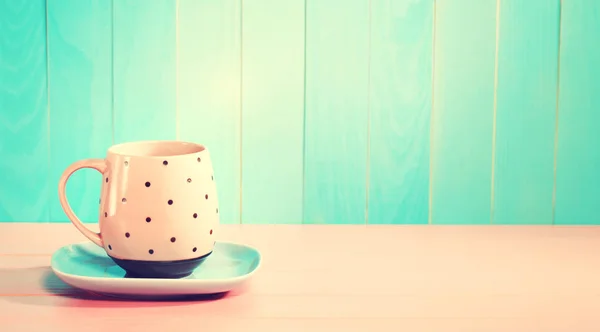 Caneca de café na mesa — Fotografia de Stock