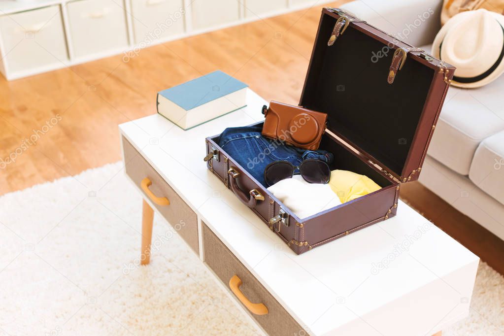 clothes and accessories in suitcase 