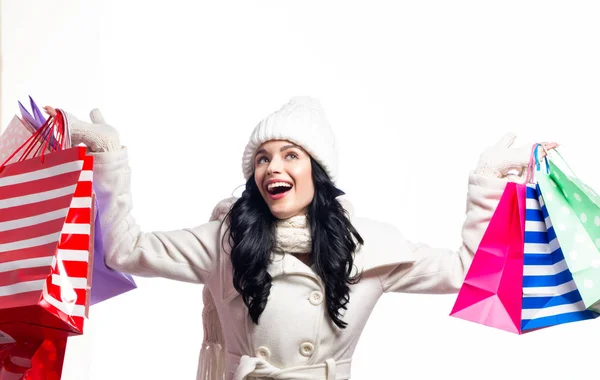 Glückliche junge Frau mit Einkaufstüten — Stockfoto
