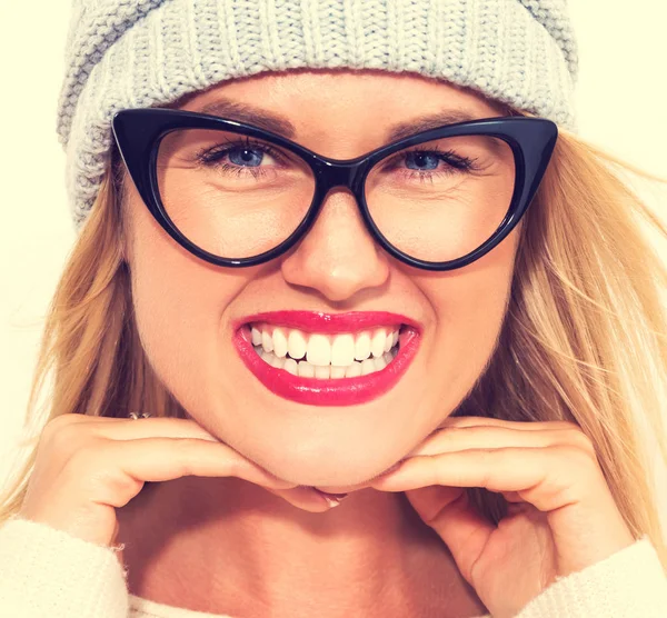 Happy young woman in winter clothes Stock Image