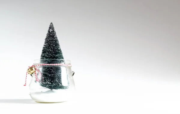 Christmas tree in a glass jar — Stock Photo, Image